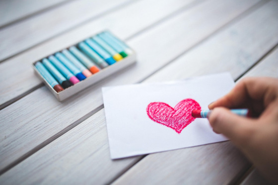 A heart drawn by hand with crayon